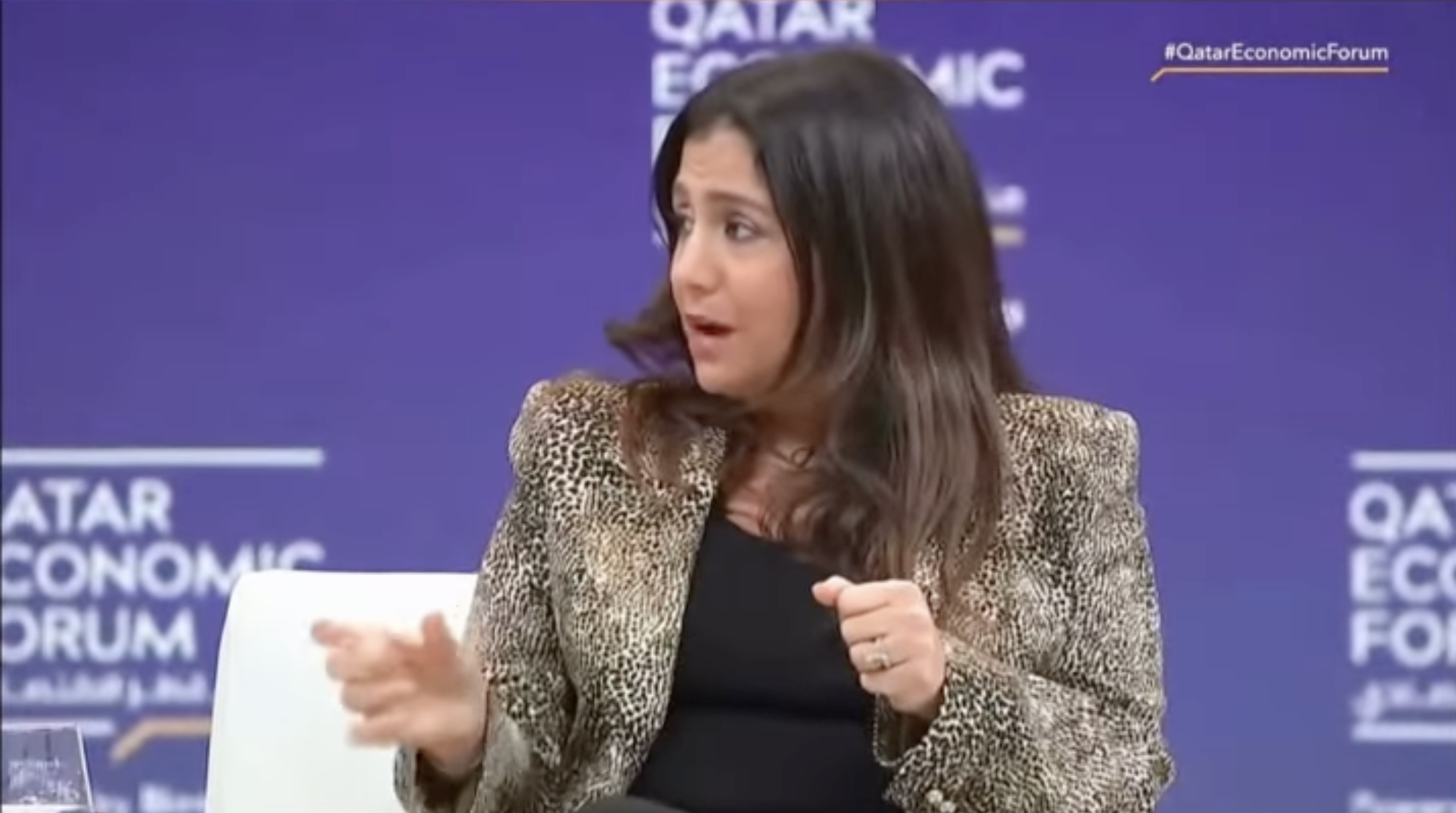 Modern corporate building in Abu Dhabi with AI governance visualization