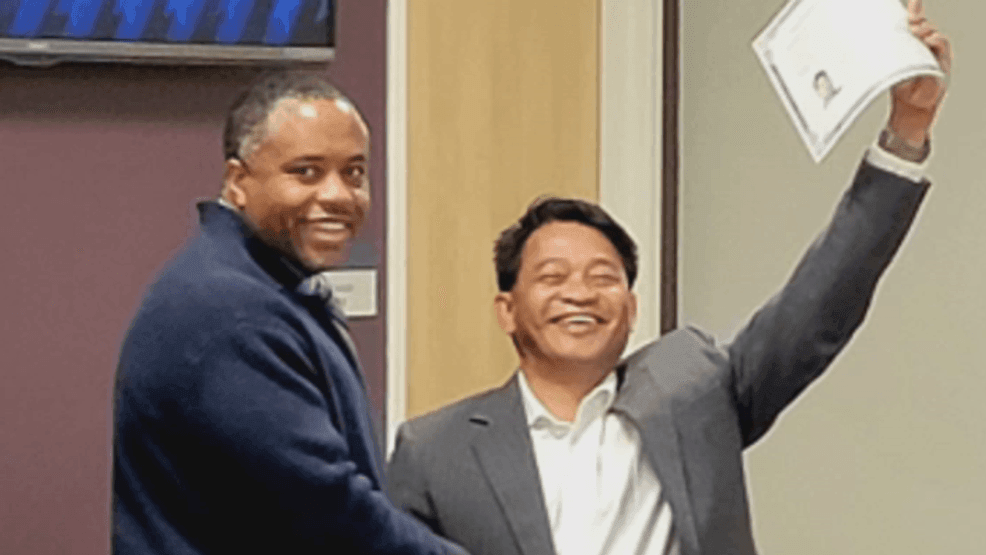 Image d'illustration pour: Local school's beloved custodian celebrates, earns American citizenship
